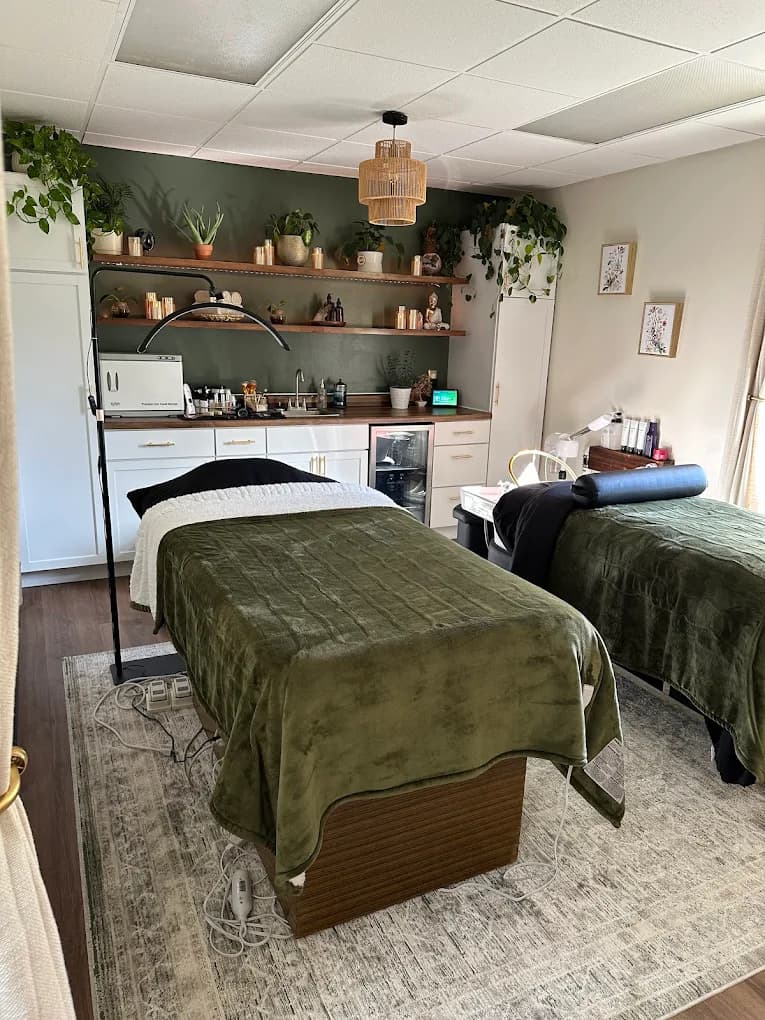 The calm, plant-filled facial treatment room at Skin + Soul near Jackson, MI